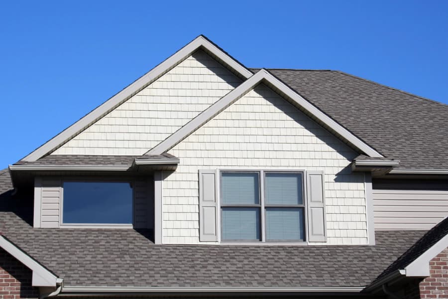 Finished asphalt roof across a residential front elevation
