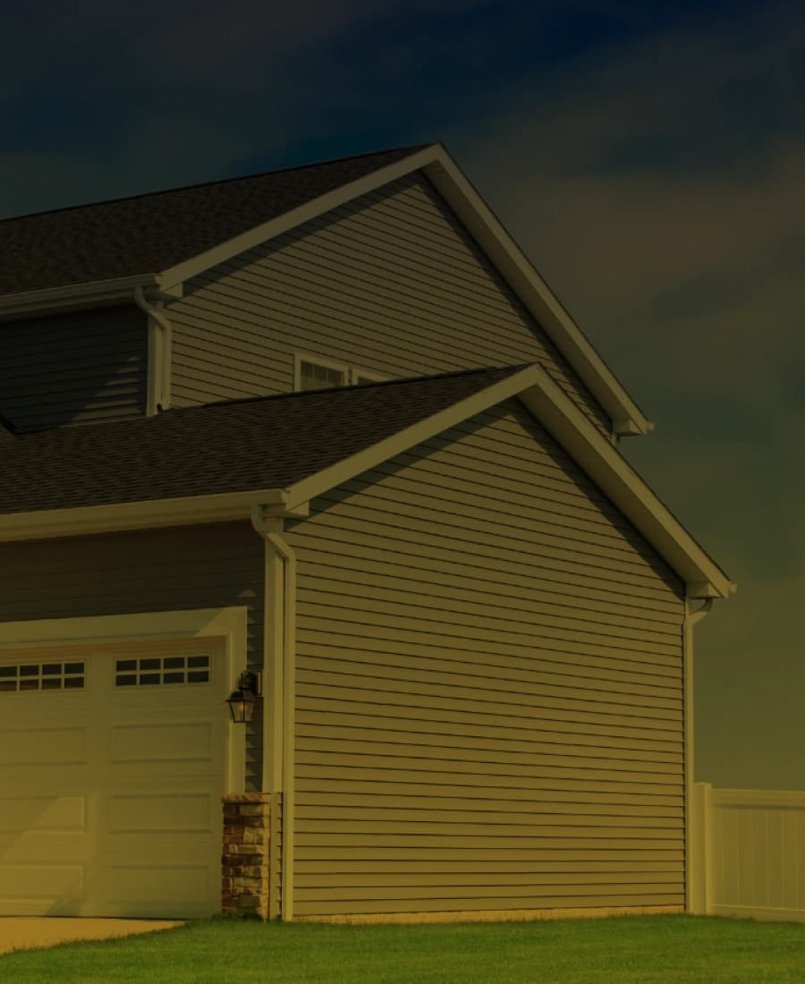 Vinyl siding beside a residential roofline
