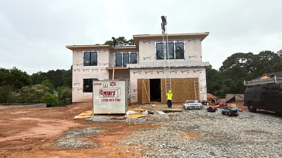 Residential exterior under construction on an open site
